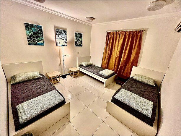 Imagen de la habitación del Hostel Home Stay. Foto 12