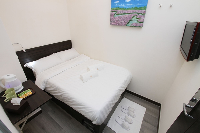 Imagen de la habitación del Hostel Homy Inn -. Foto 4