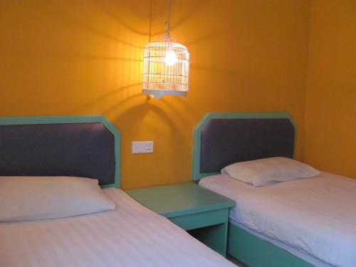 Imagen de la habitación del Hostel How Flower Yangshuo. Foto 4
