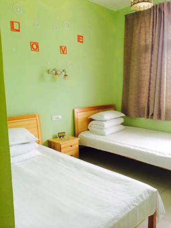 Imagen de la habitación del Hostel Huashan Hua Yi International Youth. Foto 1