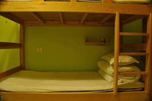 Imagen de la habitación del Hostel Huashan Hua Yi International Youth. Foto 3