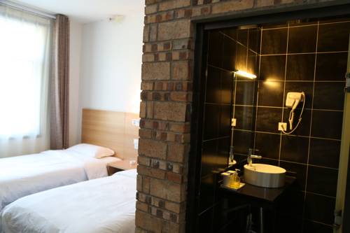 Imagen de la habitación del Hostel Huashan Lotus International. Foto 3