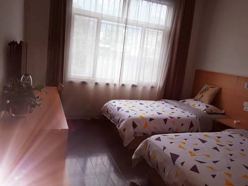 Imagen de la habitación del Hostel Huashan Lotus International. Foto 5