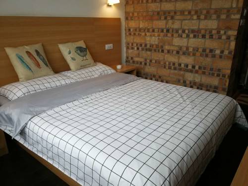 Imagen de la habitación del Hostel Huashan Lotus International. Foto 6