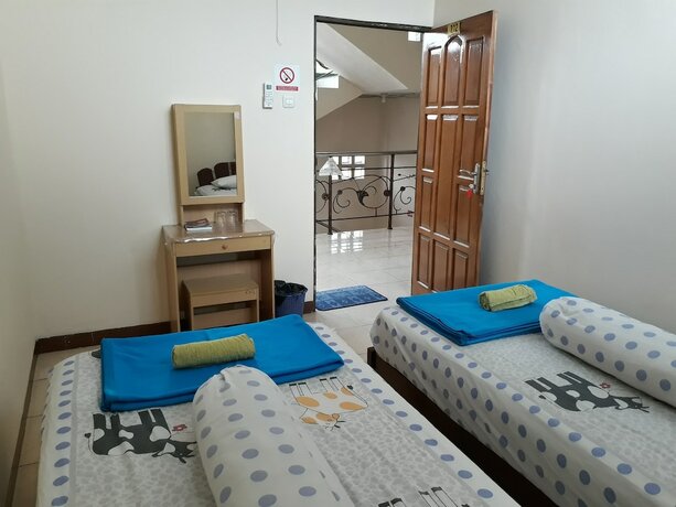 Imagen de la habitación del Hostel Imam Bonjol. Foto 18