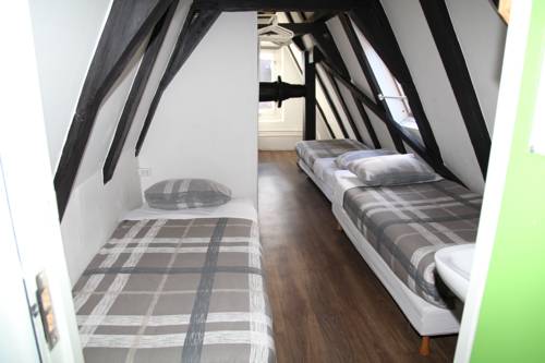 Imagen de la habitación del Hostel International Budget City Center. Foto 11