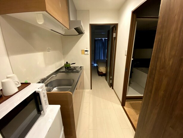 Imagen de la habitación del Hostel Jin, Osaka. Foto 11