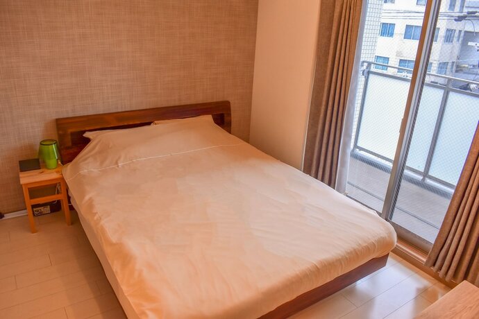 Imagen de la habitación del Hostel Jin, Osaka. Foto 19