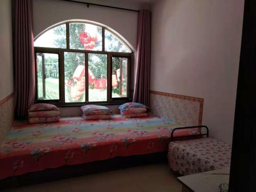 Imagen de la habitación del Hostel Jin Xin. Foto 5