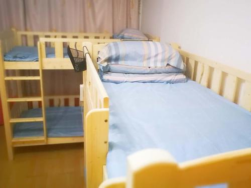 Imagen de la habitación del Hostel Jiujiang 1989 International Youth. Foto 6