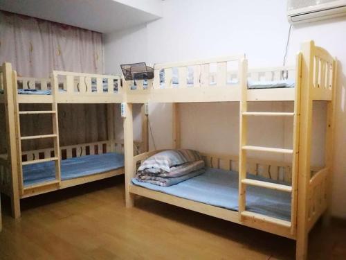 Imagen de la habitación del Hostel Jiujiang 1989 International Youth. Foto 8