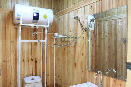 Imagen de la habitación del Hostel Kashi Maitian Youth. Foto 6