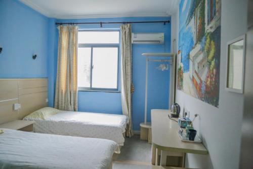 Imagen de la habitación del Hostel Kunlun International Youth. Foto 10