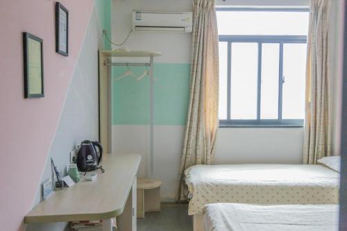 Imagen general del Hostel Kunlun International Youth. Foto 3