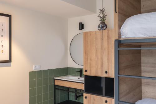 Imagen de la habitación del Hostel LATROUPE Grand Place. Foto 9