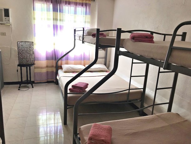 Imagen de la habitación del Hostel La Casa Roa. Foto 8