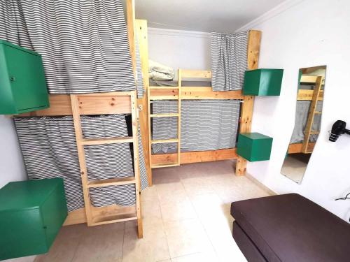 Imagen de la habitación del Hostel La Ventana Azul Surf. Foto 19