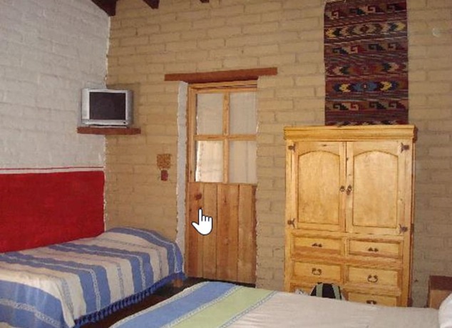 Imagen de la habitación del Hostel La Villada Inn -. Foto 3