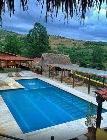 Imagen de la piscina del Hostel La Villada Inn -. Foto 14