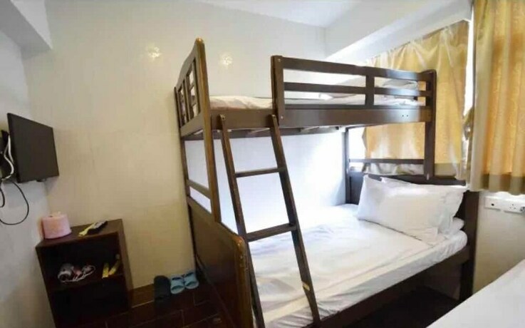 Imagen de la habitación del Hostel Lam Shan Hotel. Foto 15
