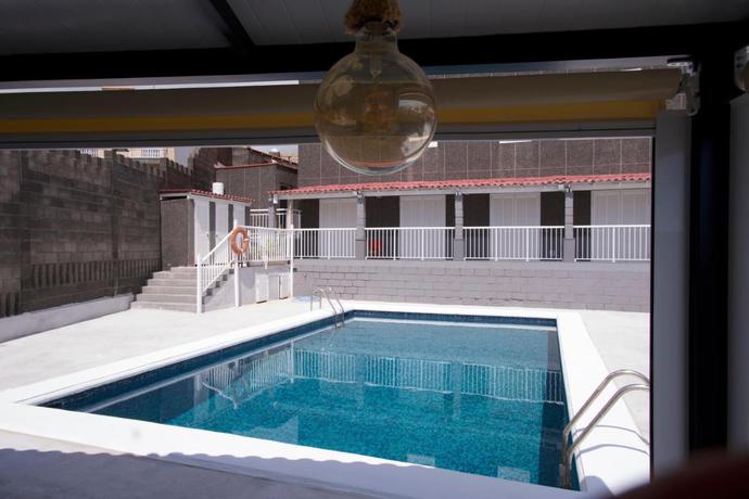 Imagen de la piscina del Hostel Las Eras Nest. Foto 13