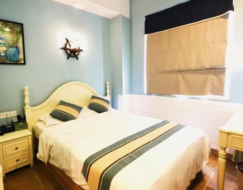 Imagen de la habitación del Hostel Leshan Haiyun International Youth. Foto 5