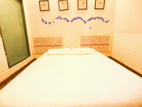 Imagen de la habitación del Hostel Leshan Haiyun International Youth. Foto 7