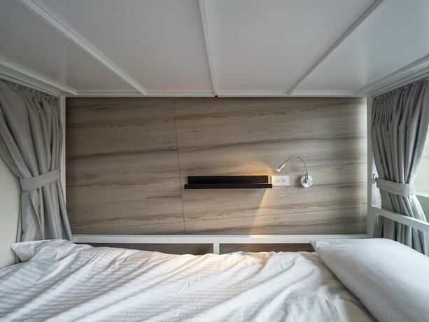 Imagen de la habitación del Hostel Light Inn -. Foto 13