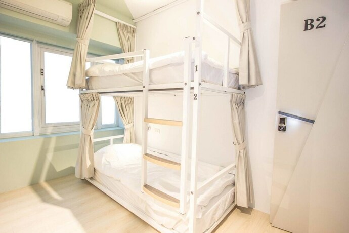 Imagen de la habitación del Hostel Light Inn -. Foto 15