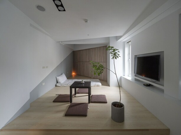 Imagen de la habitación del Hostel Light Inn -. Foto 16