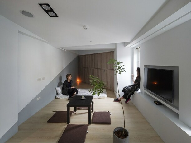 Imagen de la habitación del Hostel Light Inn -. Foto 17