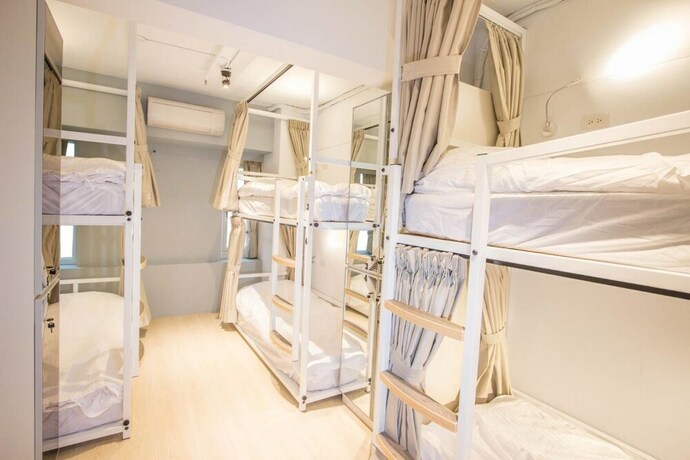 Imagen de la habitación del Hostel Light Inn -. Foto 20