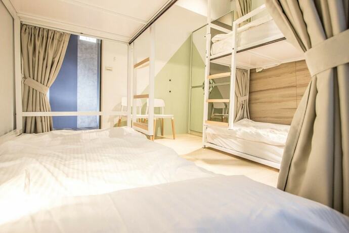 Imagen de la habitación del Hostel Light Inn -. Foto 22