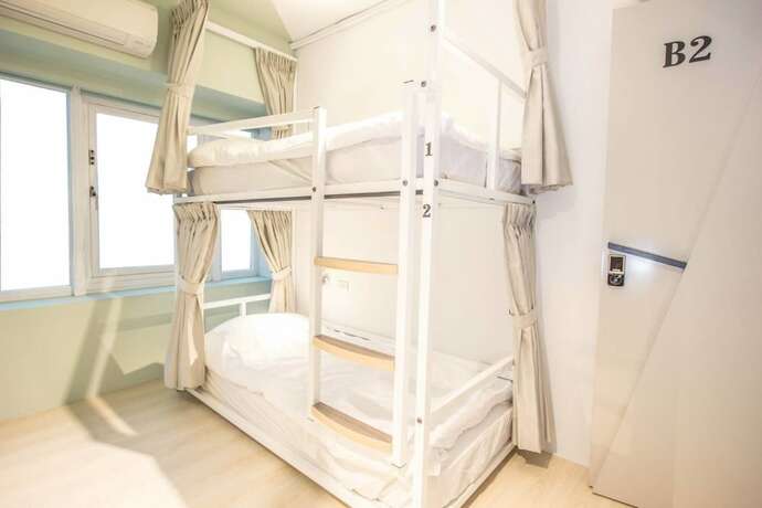 Imagen de la habitación del Hostel Light Inn -. Foto 25