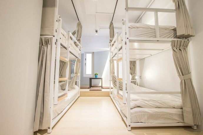 Imagen de la habitación del Hostel Light Inn -. Foto 26