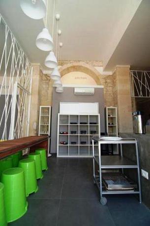 Imagen del bar/restaurante del Hostel LoL Siracusa. Foto 2