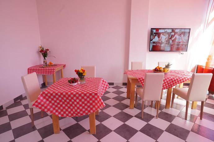 Imagen del bar/restaurante del Hostel Log Inn. Foto 3