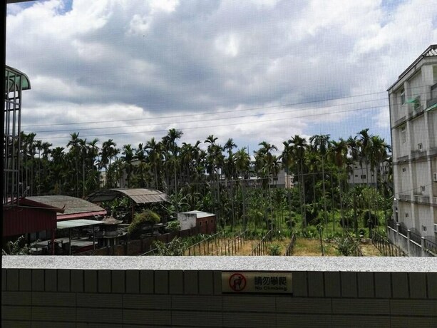 Imagen de los exteriores del Hostel Lu An Backpacker. Foto 7