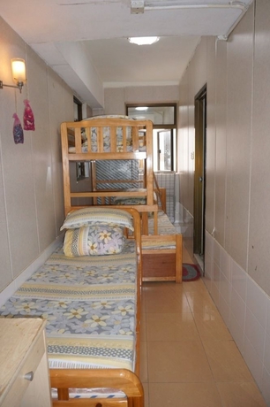 Imagen de la habitación del Hostel Lucky, Hong Kong. Foto 7