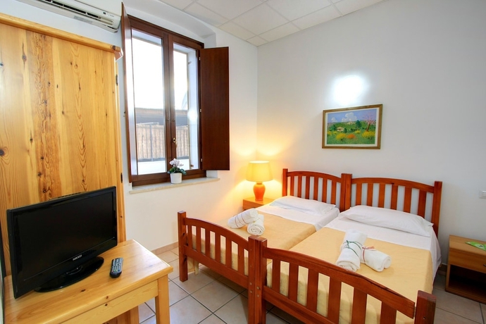 Imagen de la habitación del Hostel Marina, CAGLIARI. Foto 8