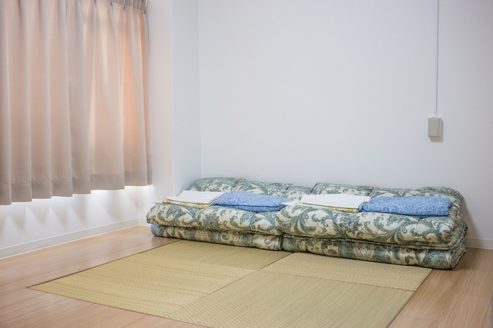 Imagen de la habitación del Hostel Merry Gate Osaka -. Foto 14