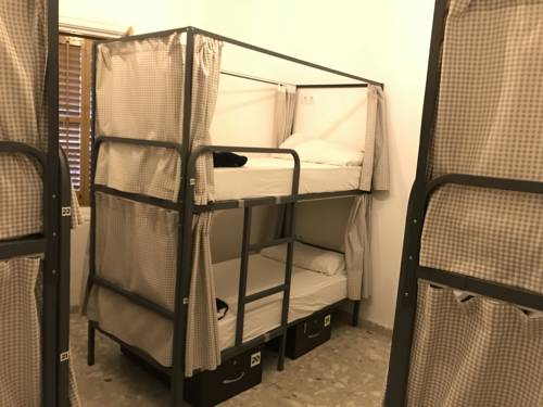 Imagen de la habitación del Hostel Mucha Masia Rural-urbà. Foto 6