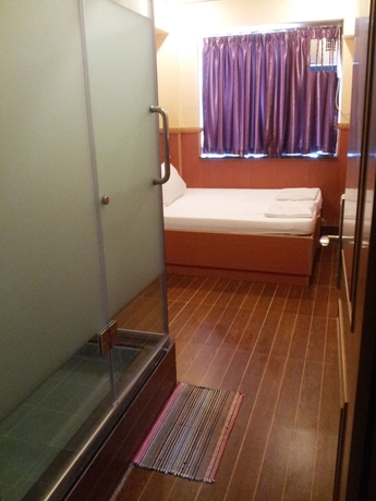 Imagen de la habitación del Hostel New Garden, Chung King Mansion. Foto 12