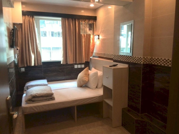 Imagen de la habitación del Hostel New Garden, Chung King Mansion. Foto 16