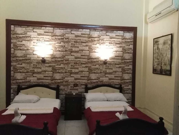 Imagen de la habitación del Hostel New Palace Hotel. Foto 14