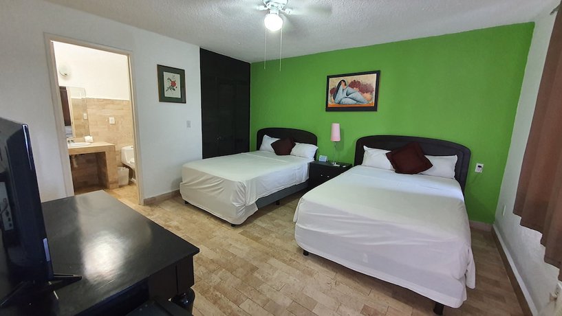Imagen de la habitación del Hostel Nirvana Hotel - Cancun Hotel Zone. Foto 14