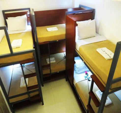 Imagen de la habitación del Hostel OYO 1111 VIP Suite. Foto 13