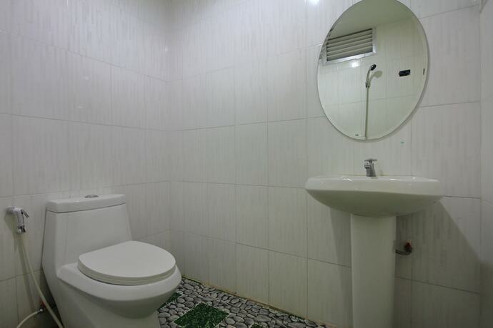 Imagen de la habitación del Hostel OYO 410 Diamond Boutique. Foto 4