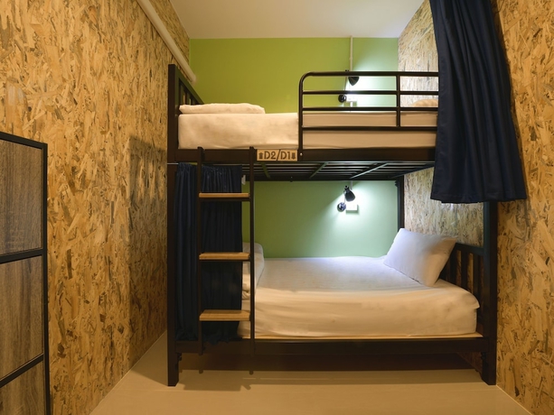 Imagen de la habitación del Hostel OYO 526 Baan Wararin. Foto 2