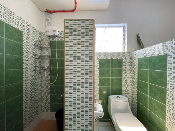 Imagen de la habitación del Hostel OYO 796 Southpoint And Restobar. Foto 9